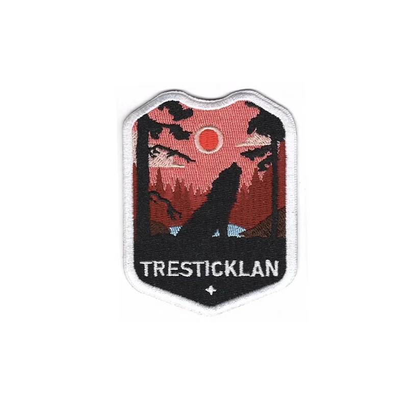 TRESTICKLAN Nationalpark Tygmärke